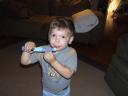 Brushing his teeth, all by himself